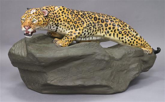 A Royal Doulton Leopard on Rock, HN2638 length 40cm